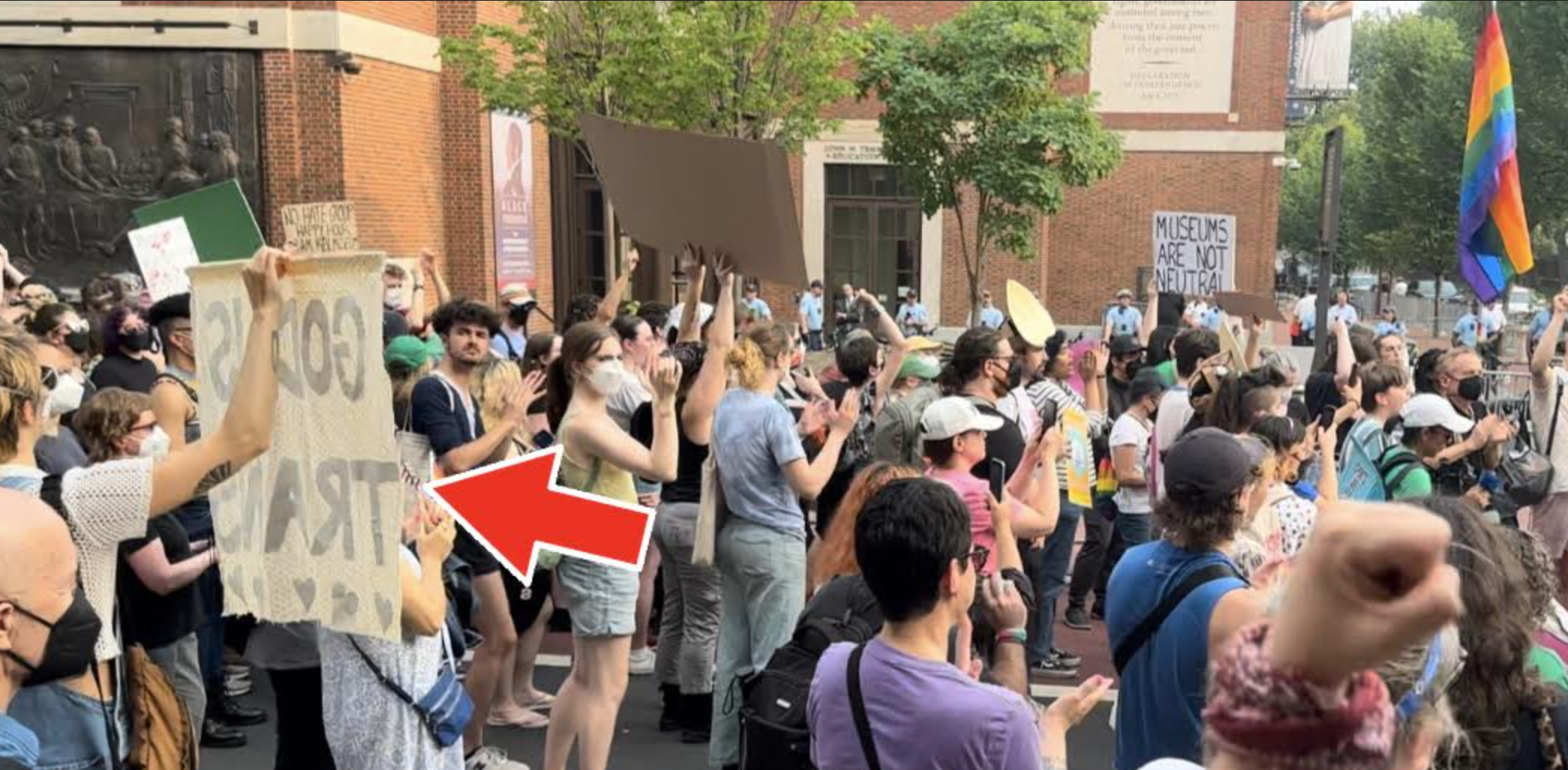 'God is trans' sign